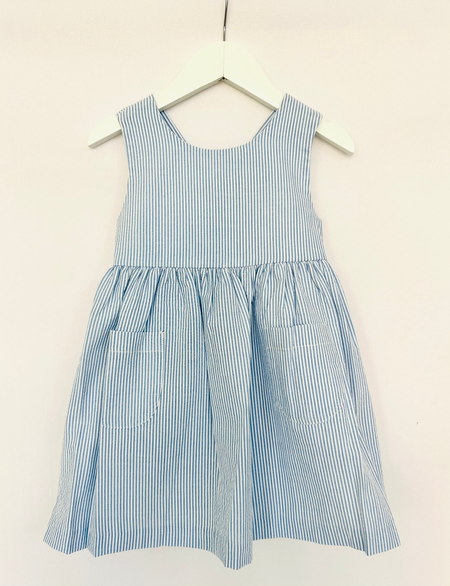 Girl’s Blue Dress with Crossed Back
