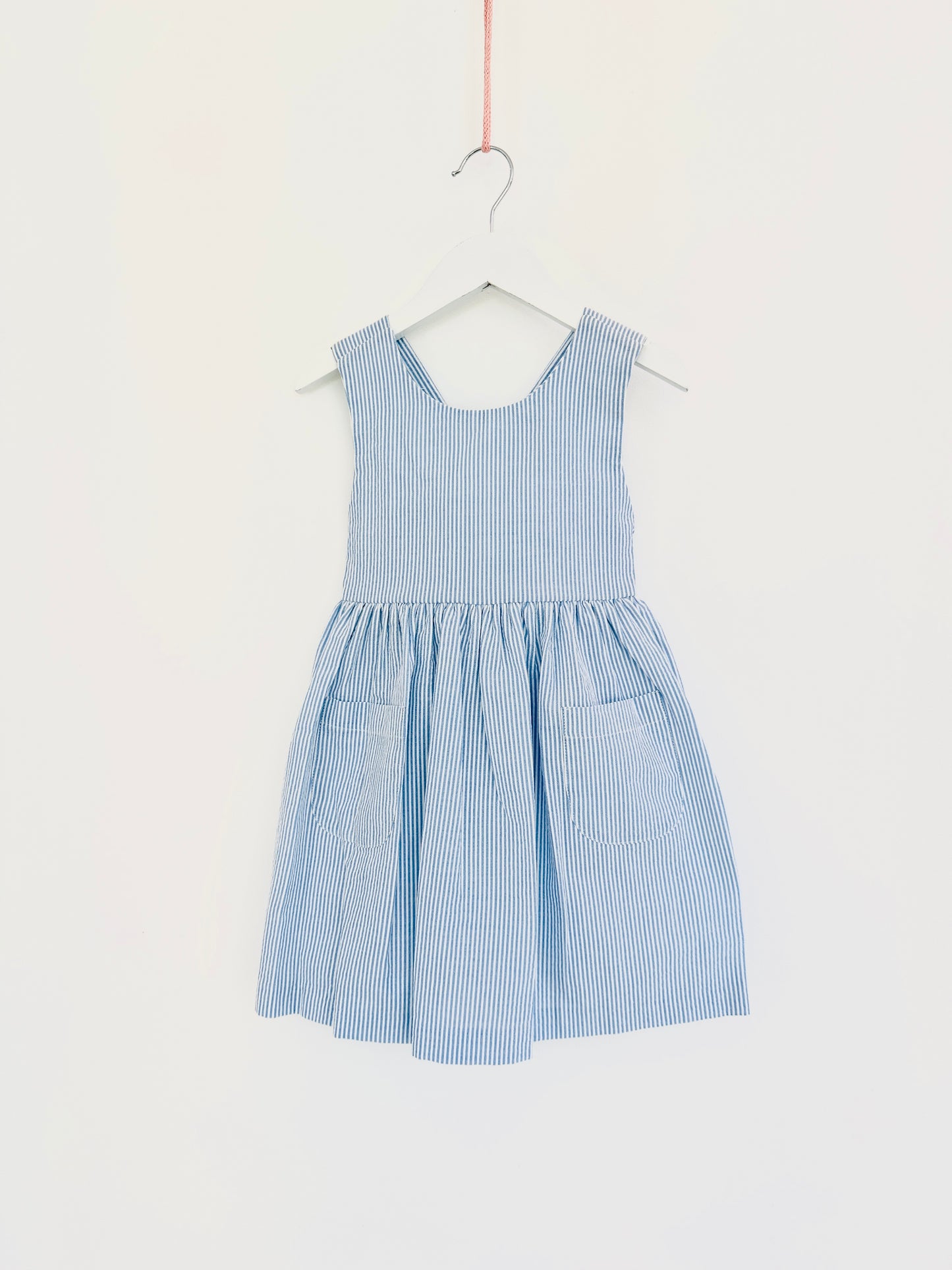Girl’s Blue Seersucker Dress with Crossed Back