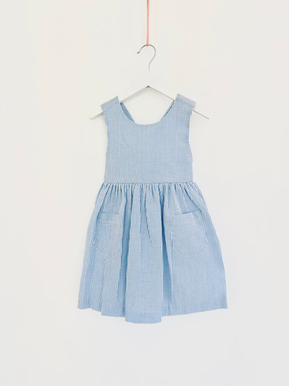 Girl’s Blue Seersucker Dress with Crossed Back