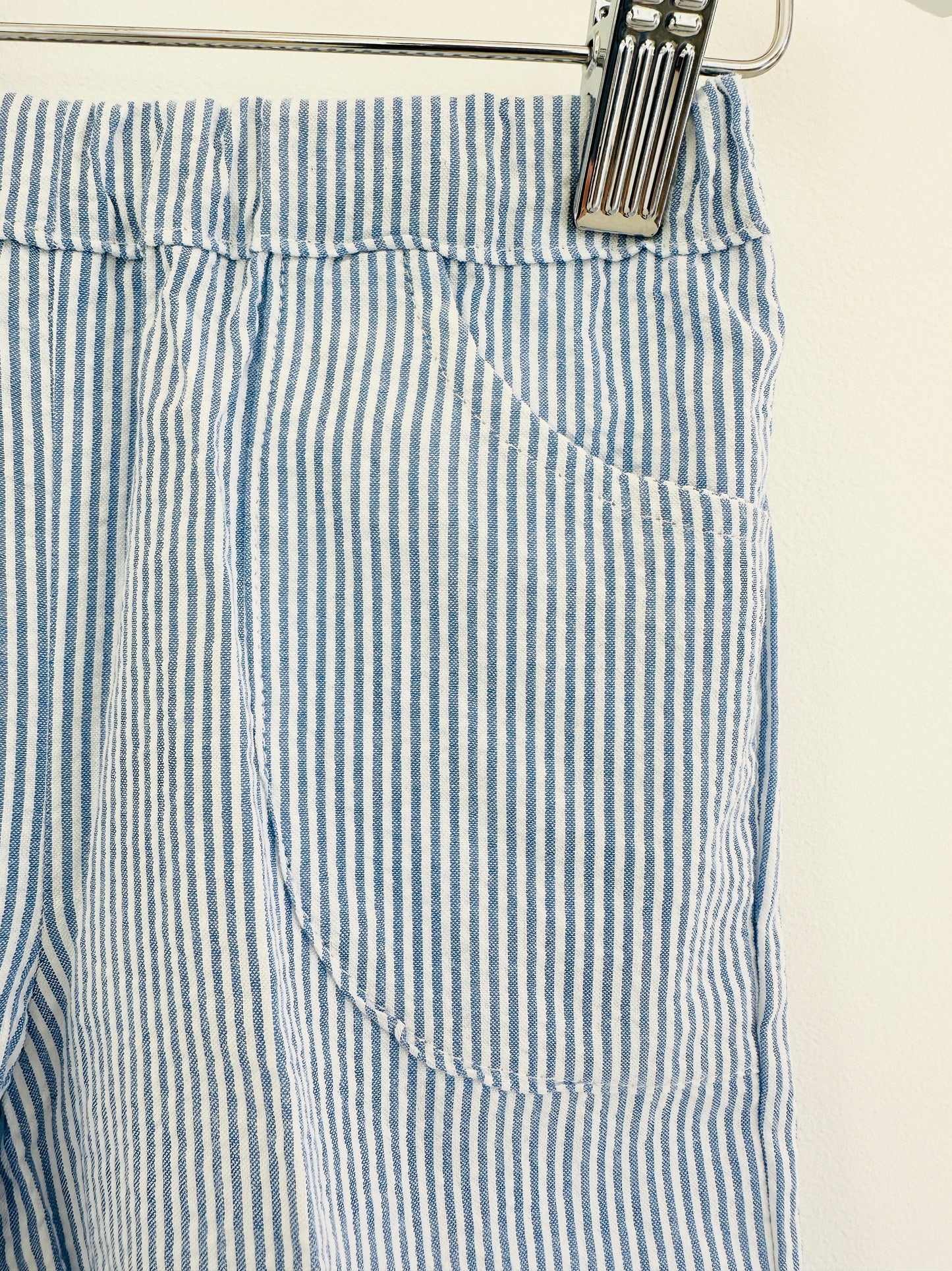 Girl’s Blue Seersucker Pants and Sleeveless Shirt Set with Floral Ruffle