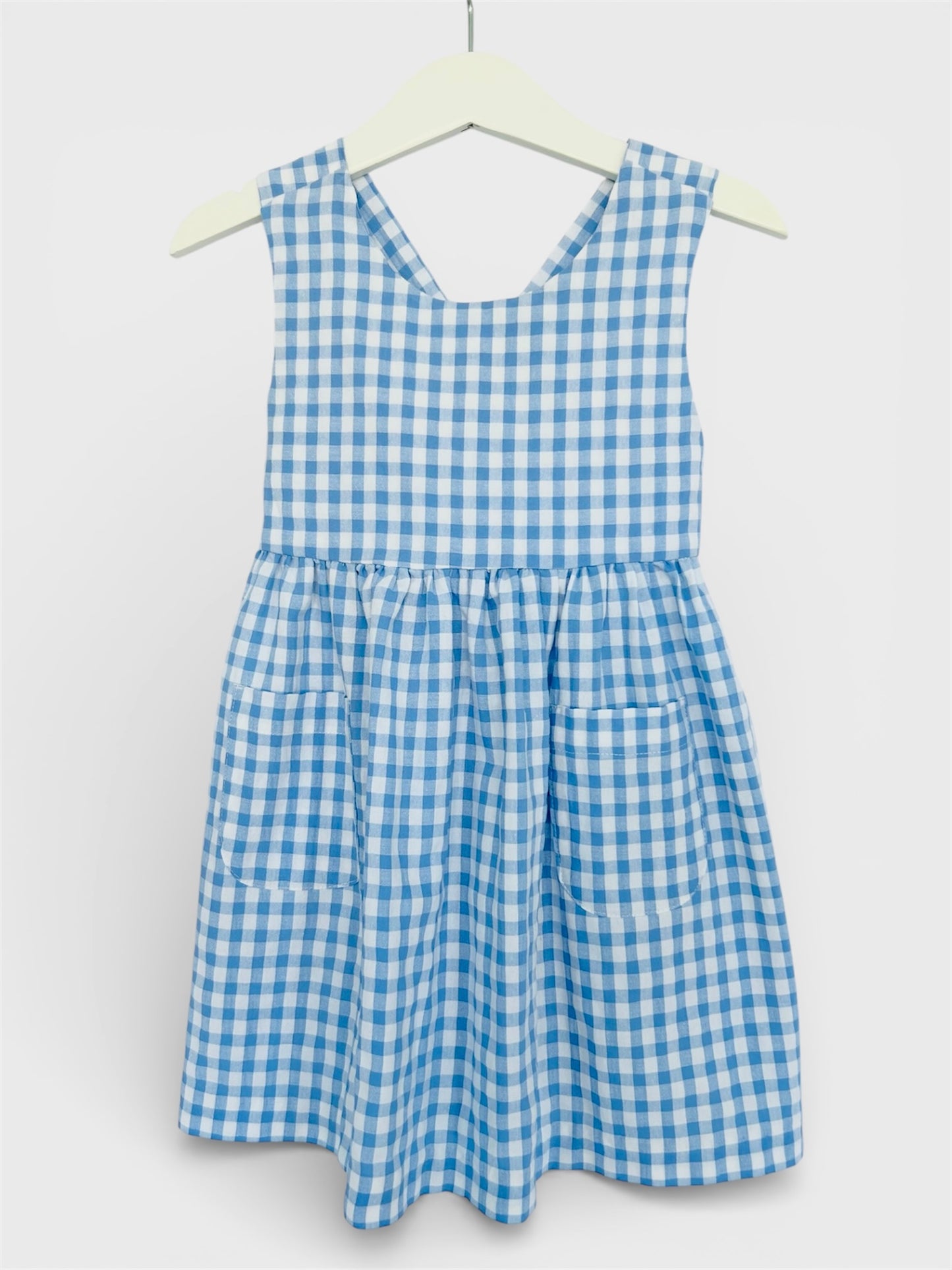 Girl’s Blue Dress with Crossed Back